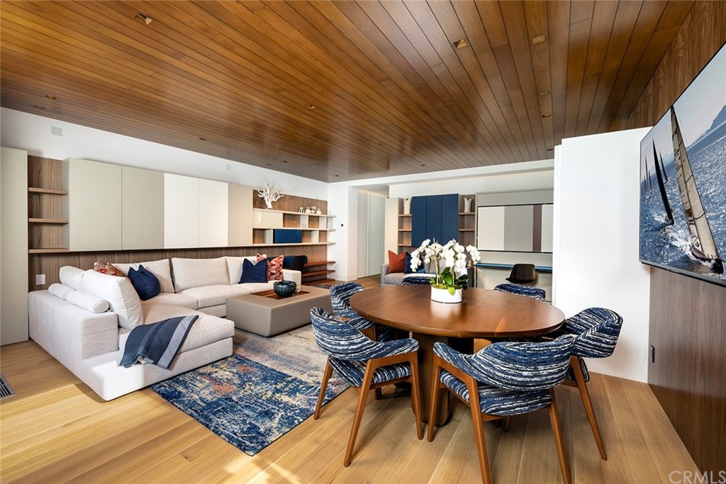 2538 Monaco Drive Laguna Beach, CA 92651 - Photo 21 of 26 a living room with furniture and wooden floor