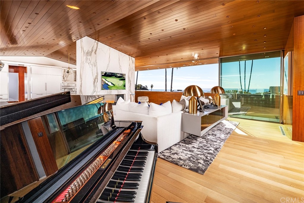 2538 Monaco Drive Laguna Beach, CA 92651 - Photo 6 of 26 a living room with couch next to a large window