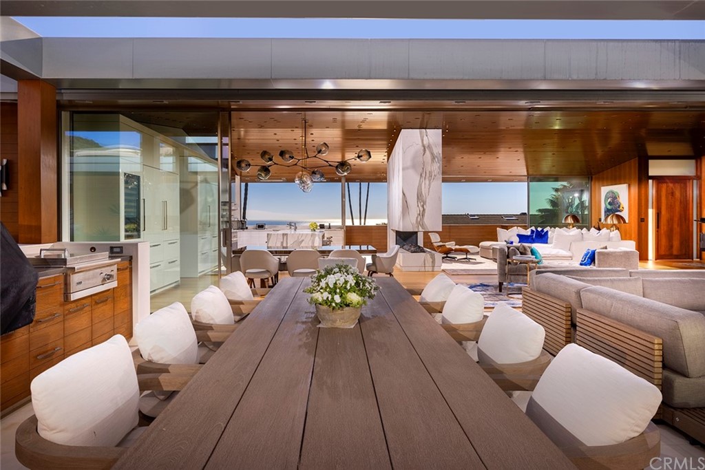 2538 Monaco Drive Laguna Beach, CA 92651 - Photo 10 of 26 a living room with furniture and a large window