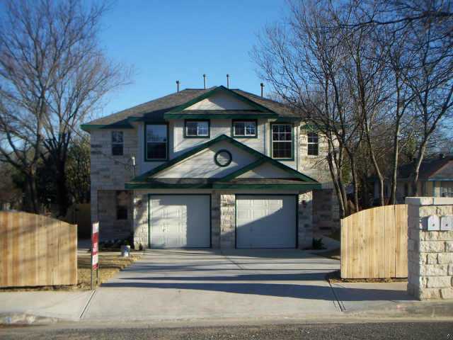 6913 Bennett Avenue Austin, TX 78752 - Photo 1 of 1 a front view of a house with a yard