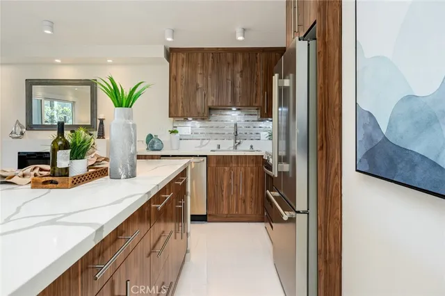 $749,000 | 100 Scholz Plaza, Unit 205, Newport Beach, CA 92663