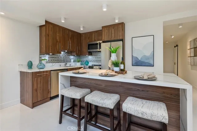 $749,000 | 100 Scholz Plaza, Unit 205, Newport Beach, CA 92663