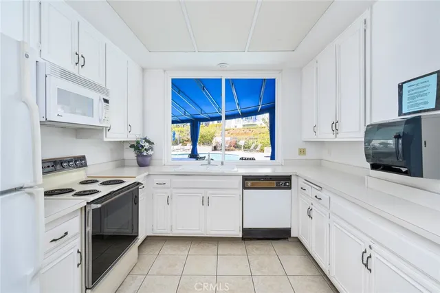 $749,000 | 100 Scholz Plaza, Unit 205, Newport Beach, CA 92663