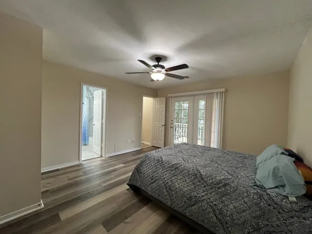 a view of a hallway with entryway and closet