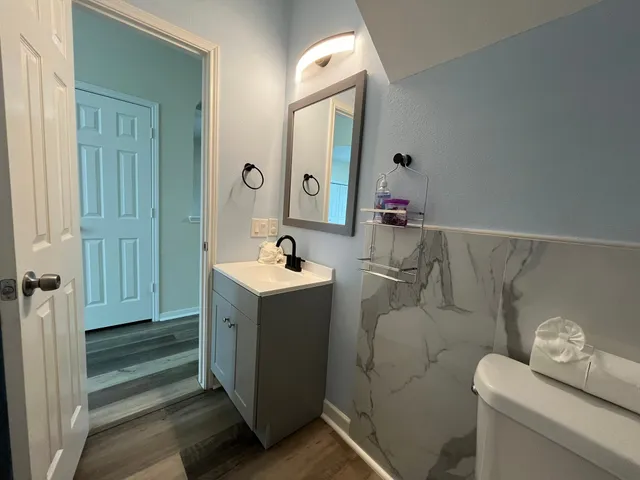 a kitchen with a refrigerator sink and microwave