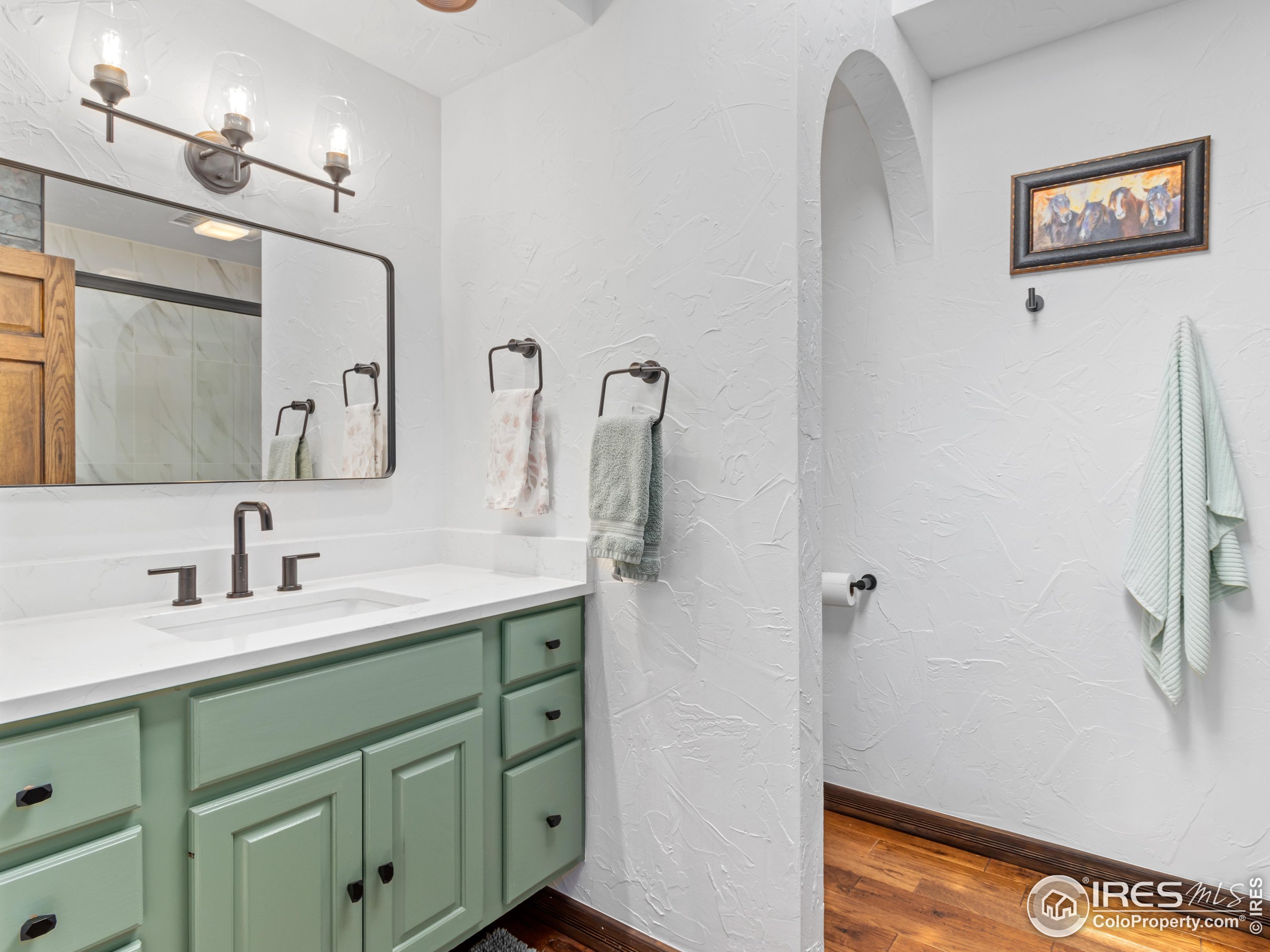 2701 Fall River Road Estes Park, CO 80517 - Photo 30 of 40 a bathroom with a sink and a mirror