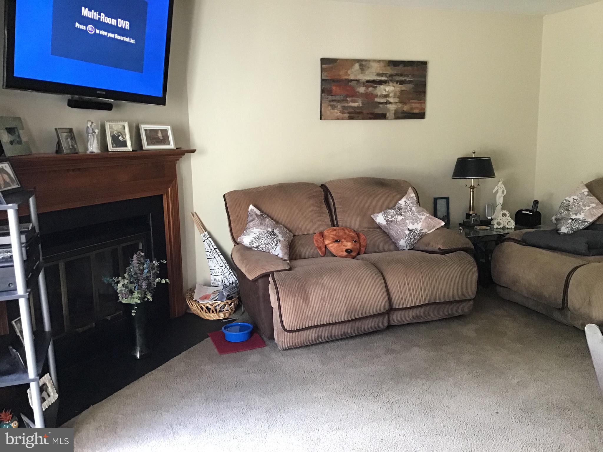 27 Stratton Court Trenton, NJ 08691 - Photo 12 of 21 a living room with furniture and a fireplace