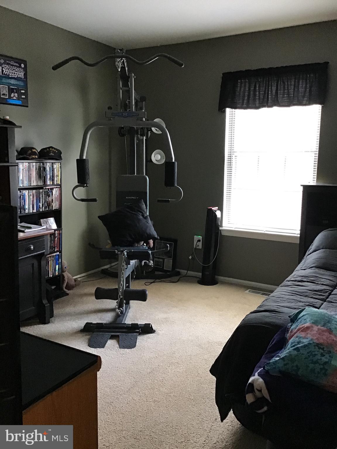 27 Stratton Court Trenton, NJ 08691 - Photo 16 of 21 a room with gym equipment and a large window
