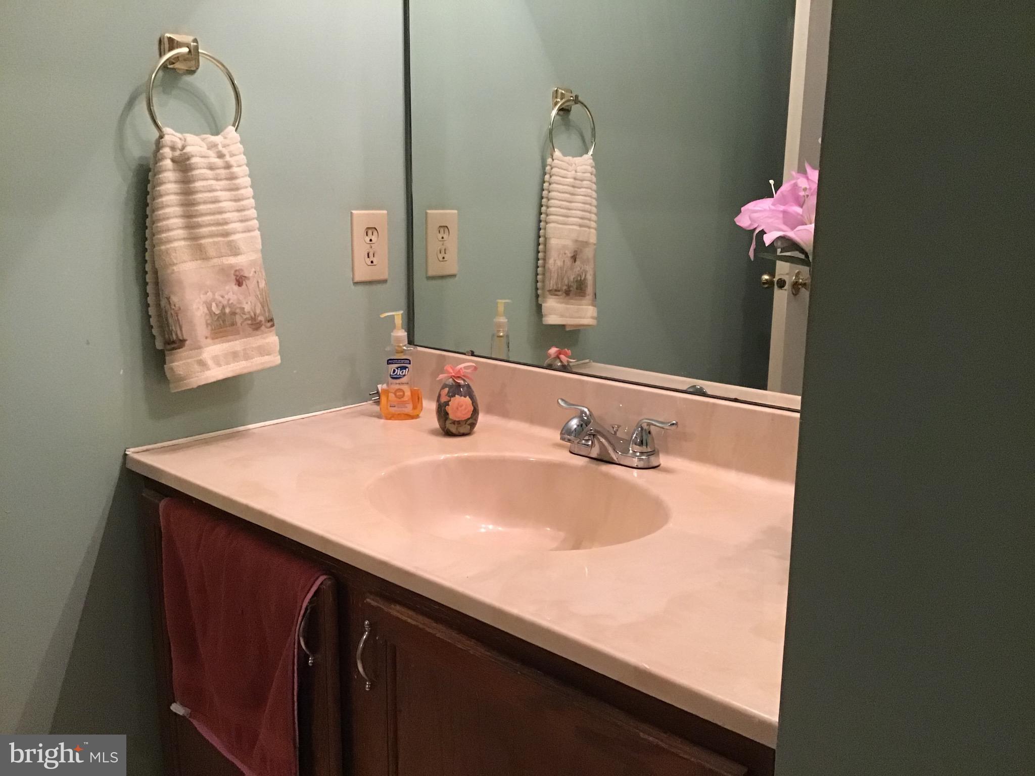 27 Stratton Court Trenton, NJ 08691 - Photo 21 of 21 a bathroom with a sink vanity and a mirror