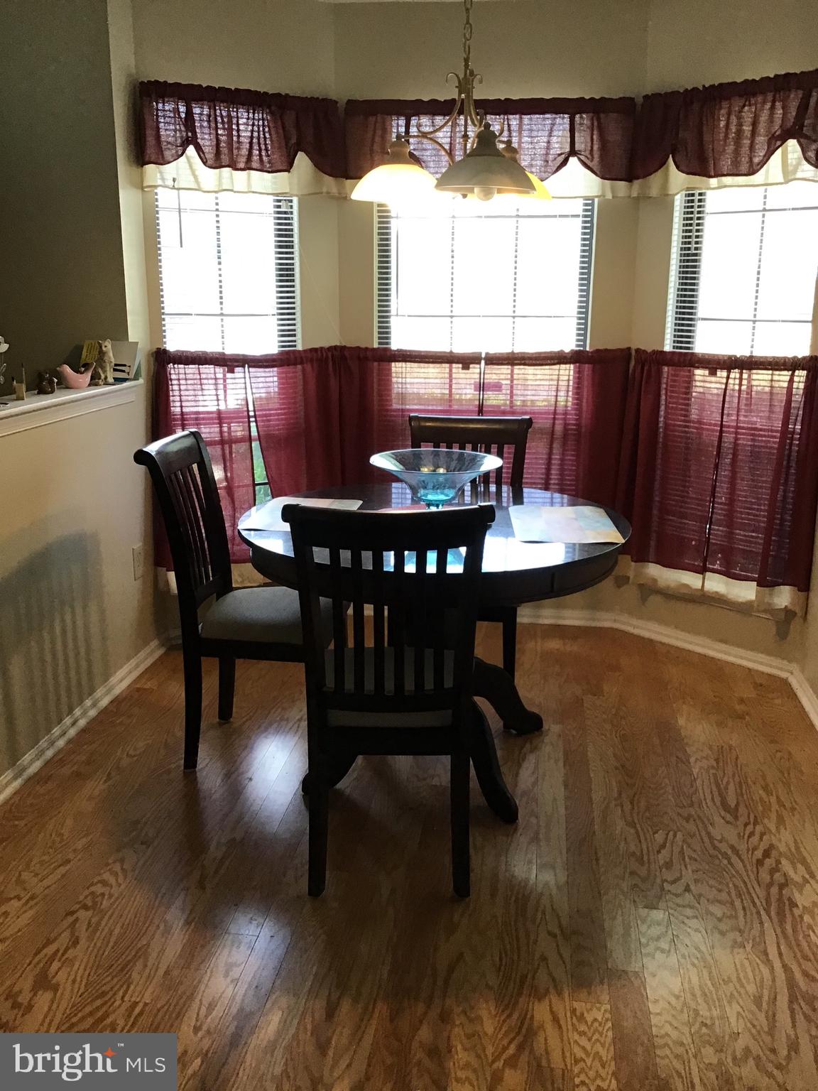 27 Stratton Court Trenton, NJ 08691 - Photo 5 of 21 a view of a dining room with furniture window and outside view