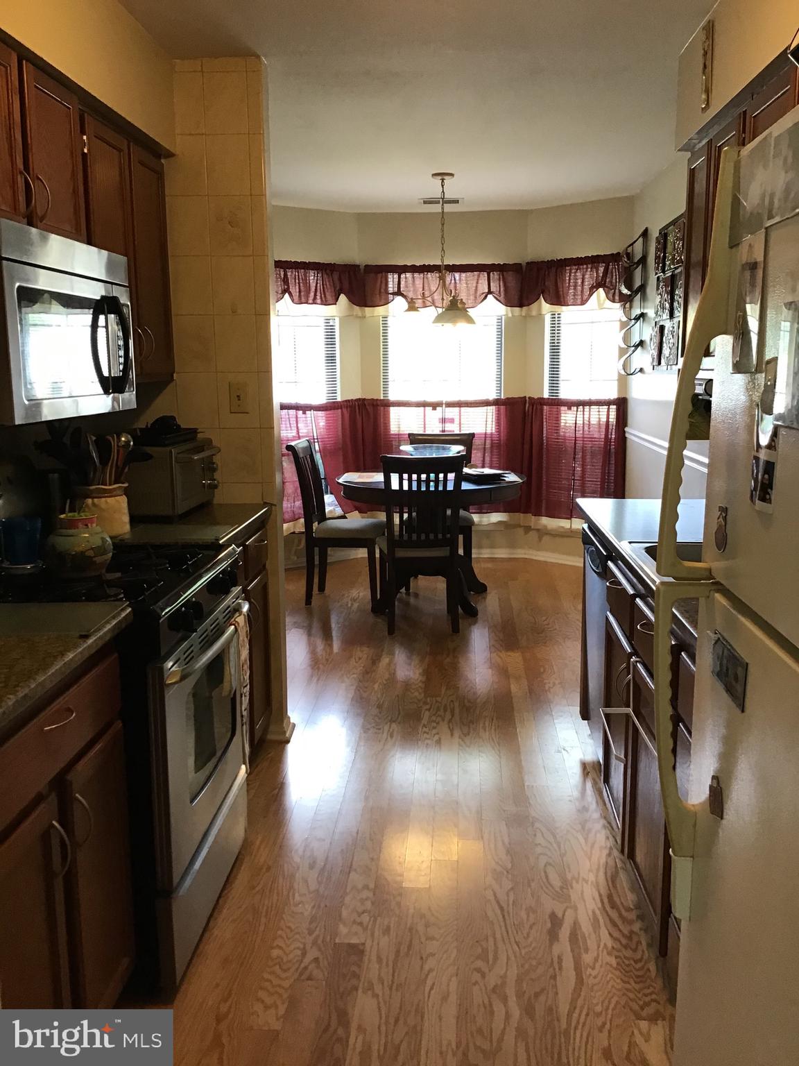 27 Stratton Court Trenton, NJ 08691 - Photo 8 of 21 a kitchen with lots of counter top space and a window