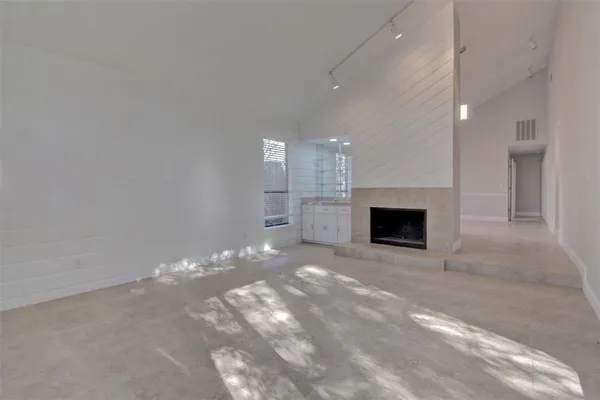 a view of a livingroom with a fireplace
