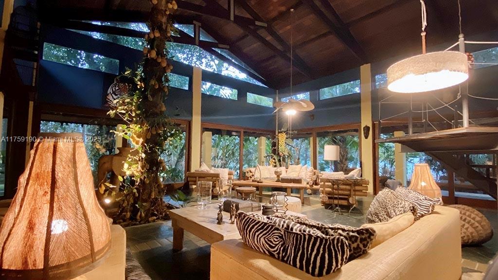 Praia Do Flamengo Saco Da Ribeira undefined, SP 0 - Photo 11 of 33 a outdoor living space with furniture and garden view