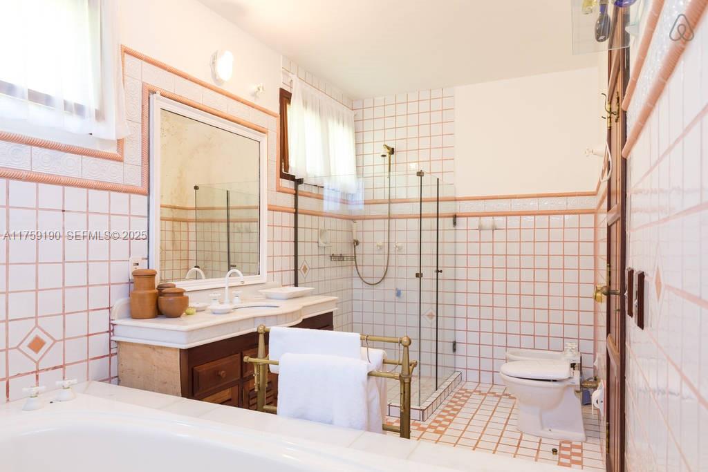 Praia Do Flamengo Saco Da Ribeira undefined, SP 0 - Photo 17 of 33 a bathroom with a sink toilet and shower