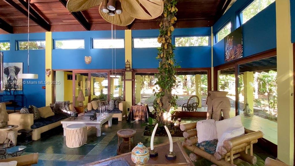 Praia Do Flamengo Saco Da Ribeira undefined, SP 0 - Photo 25 of 33 a room with lots of furniture and windows