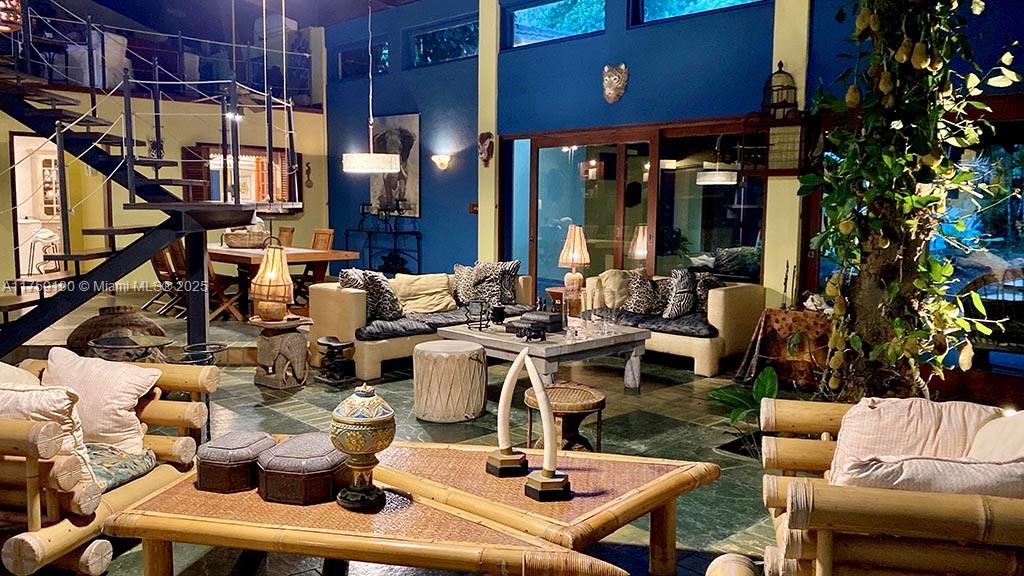 Praia Do Flamengo Saco Da Ribeira undefined, SP 0 - Photo 6 of 33 a view of a patio with dining table and chairs