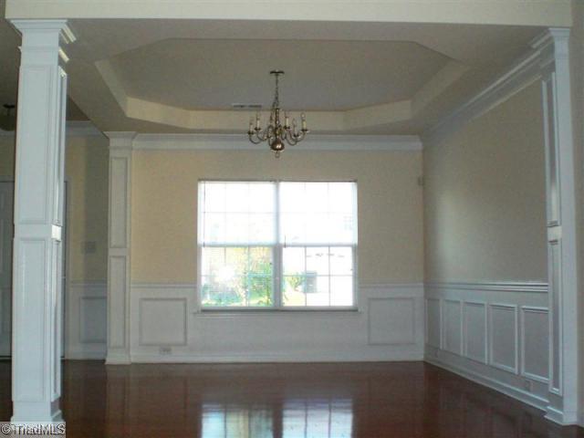 879 Jennifer Lane High Point, NC 27265 - Photo 4 of 11 Dining Room. Formal Dining Room with Trey, Wainscot & Chair Rail