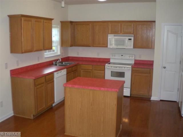 879 Jennifer Lane High Point, NC 27265 - Photo 6 of 11 Kitchen. Kitchen with Island and Pantry