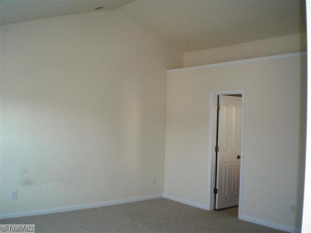 879 Jennifer Lane High Point, NC 27265 - Photo 7 of 11 Master Bedroom. Master Bedroom with Vaulted Ceiling
