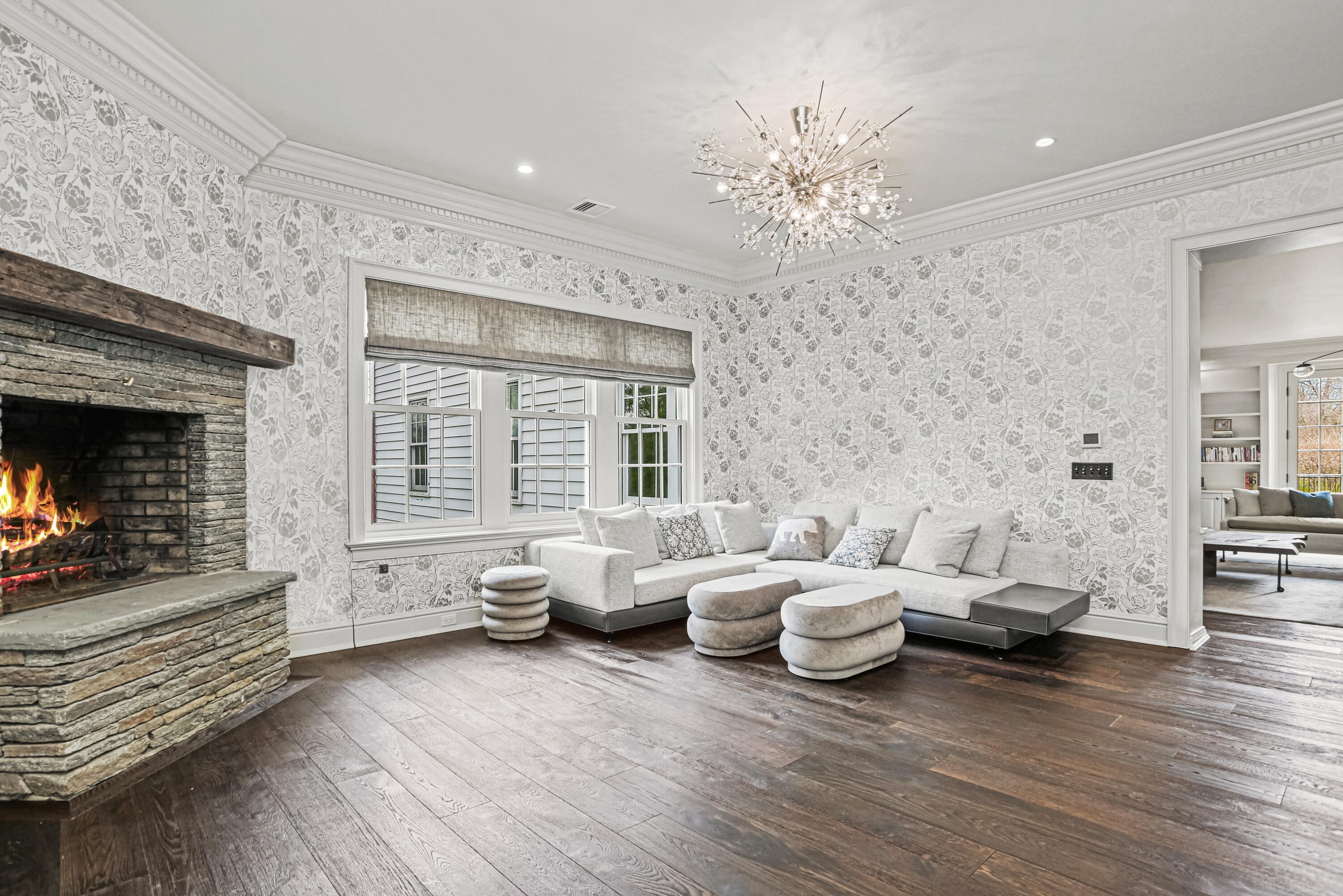313 Stanwich Road Greenwich, CT 06830 - Photo 11 of 23 a living room with furniture and a fireplace