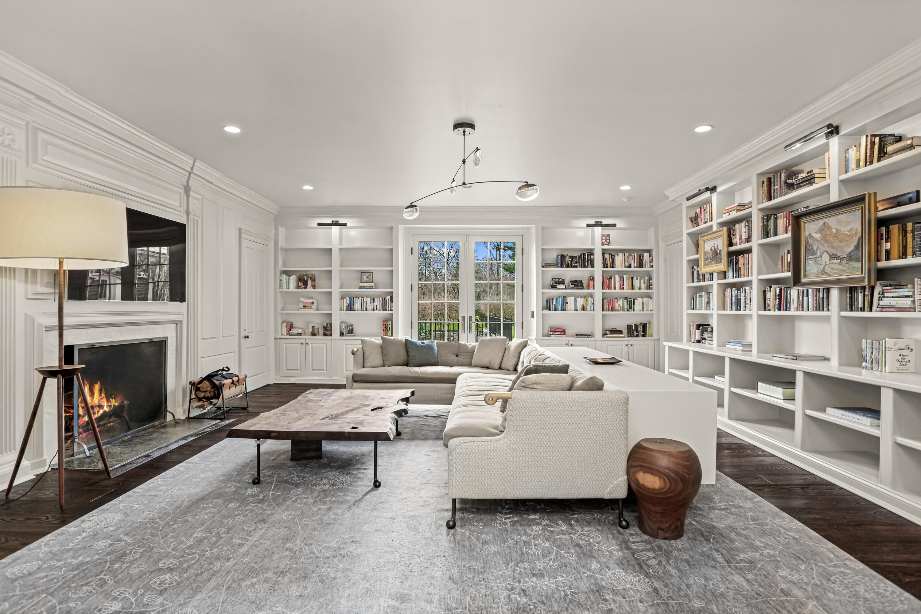313 Stanwich Road Greenwich, CT 06830 - Photo 12 of 23 a living room with furniture and a fireplace