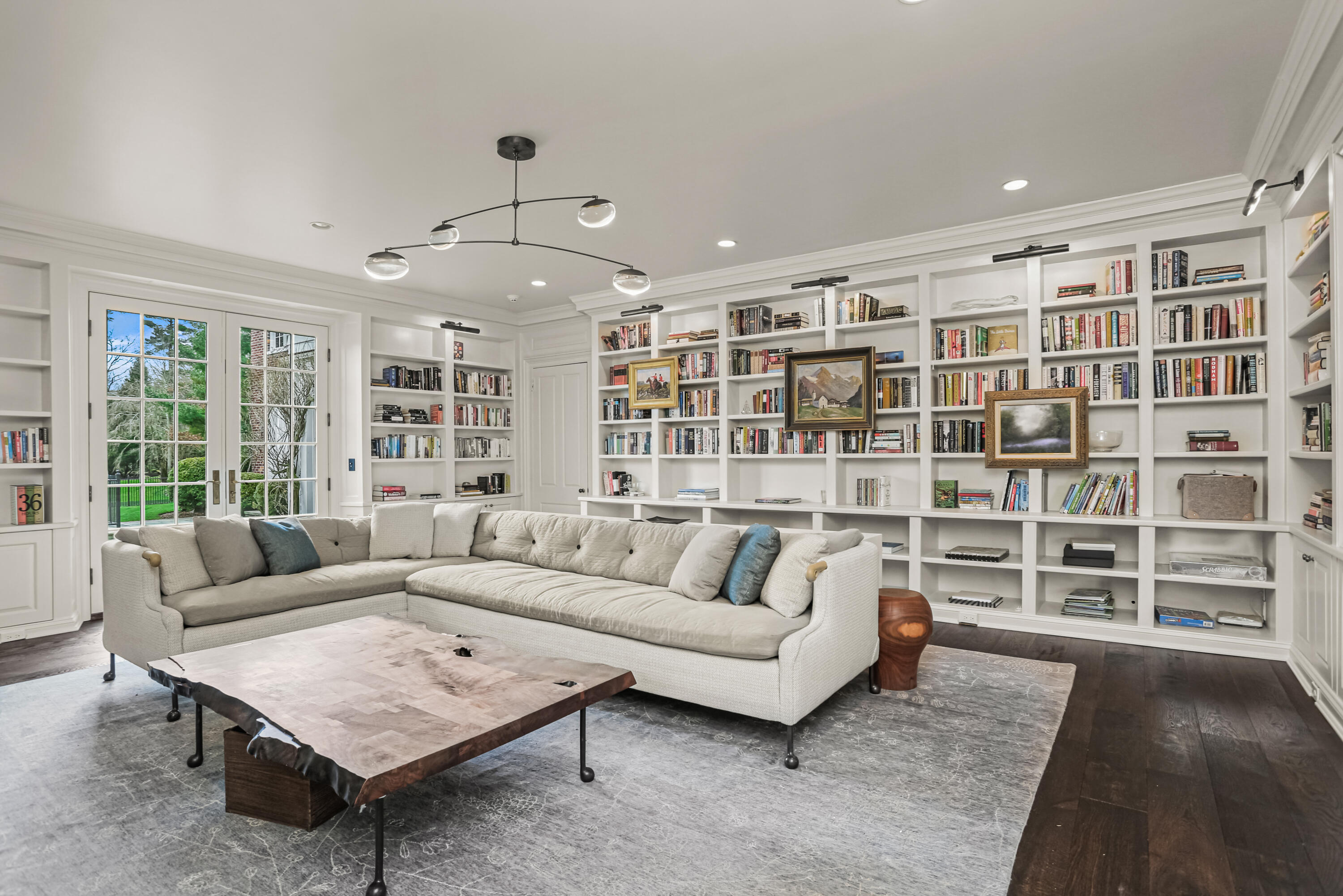 313 Stanwich Road Greenwich, CT 06830 - Photo 13 of 23 a living room with furniture and a flat screen tv