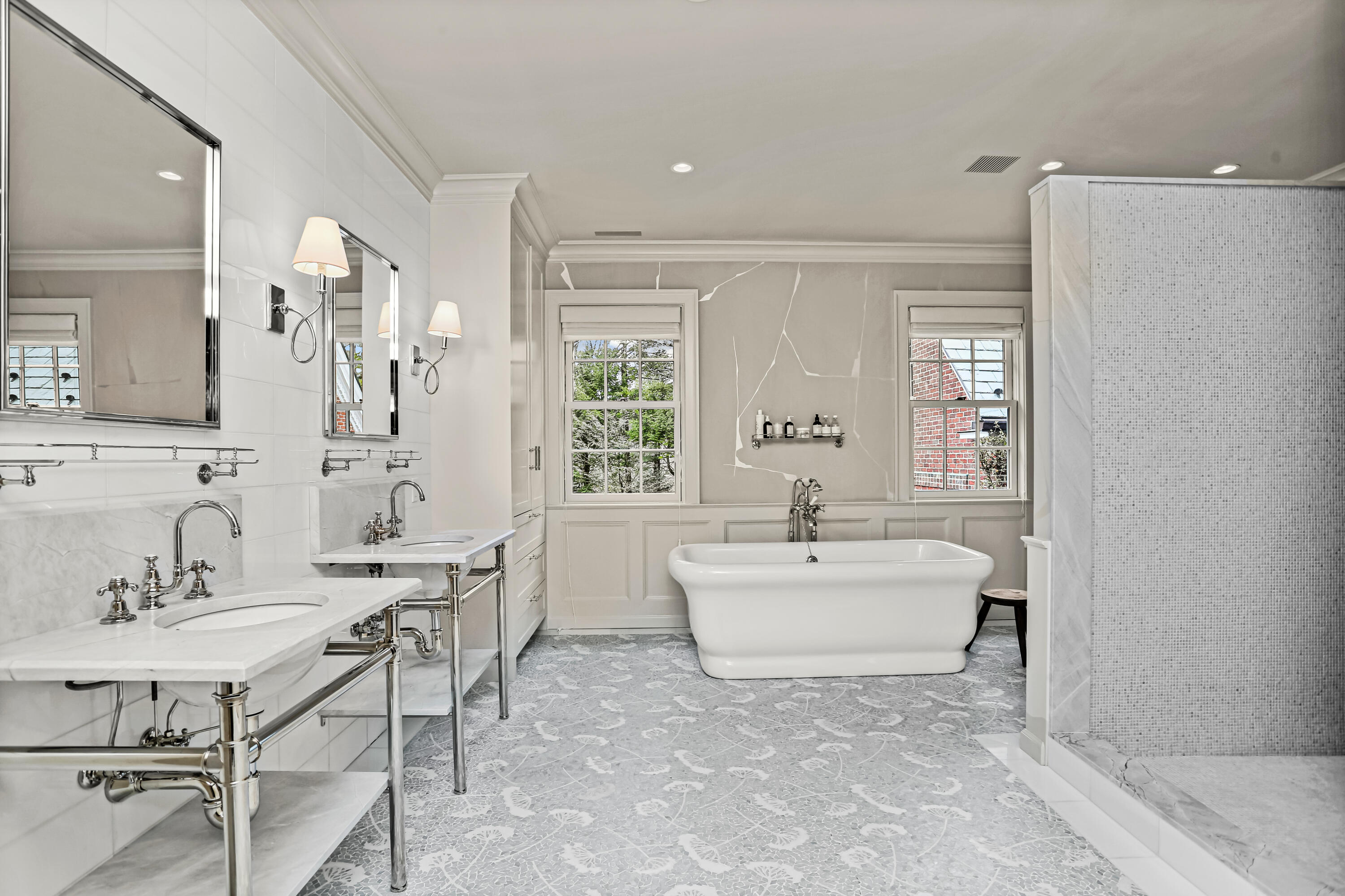 313 Stanwich Road Greenwich, CT 06830 - Photo 16 of 23 a bathroom with a sink mirror and a bathtub