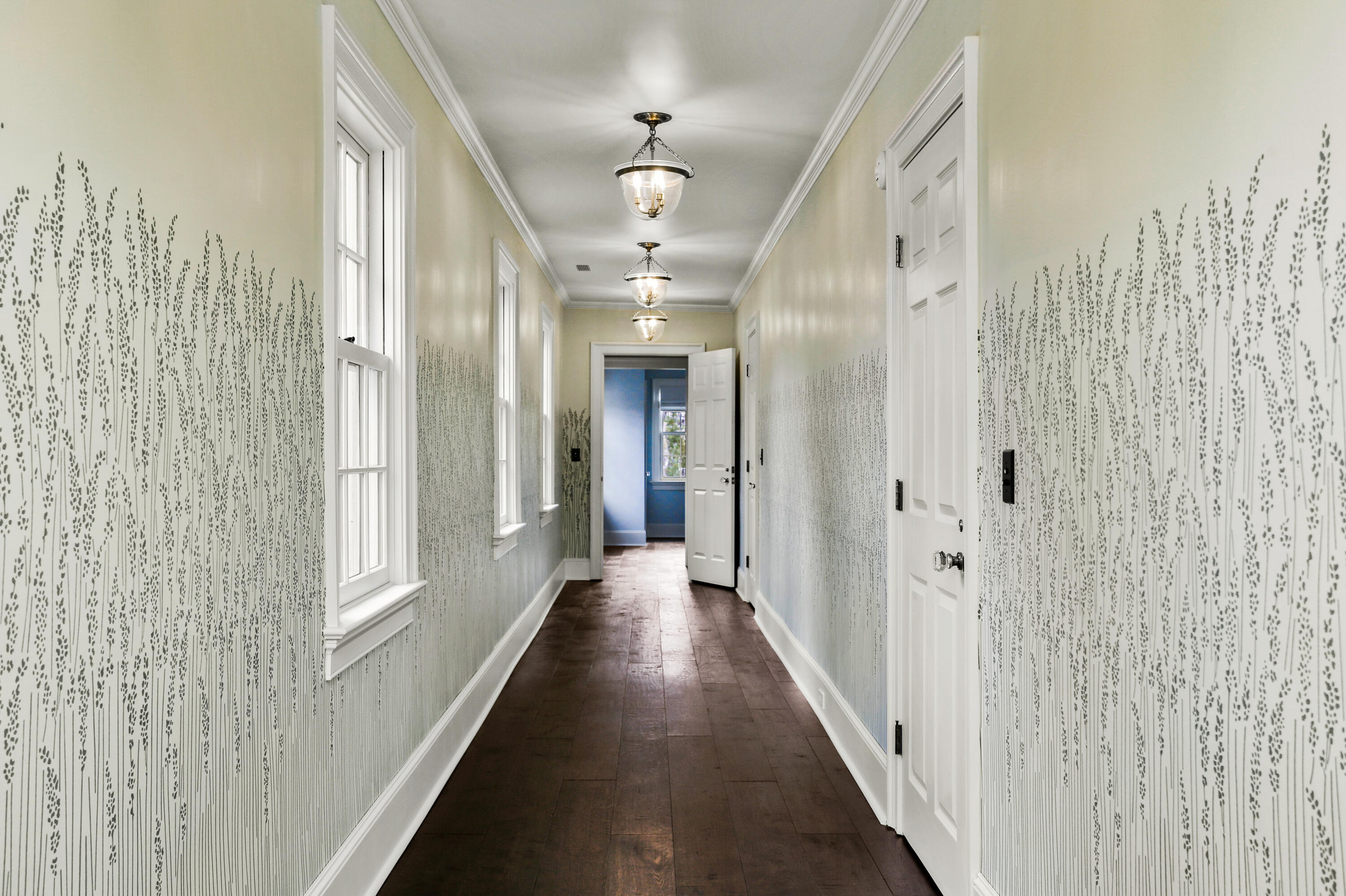 313 Stanwich Road Greenwich, CT 06830 - Photo 17 of 23 a view of a hallway with windows