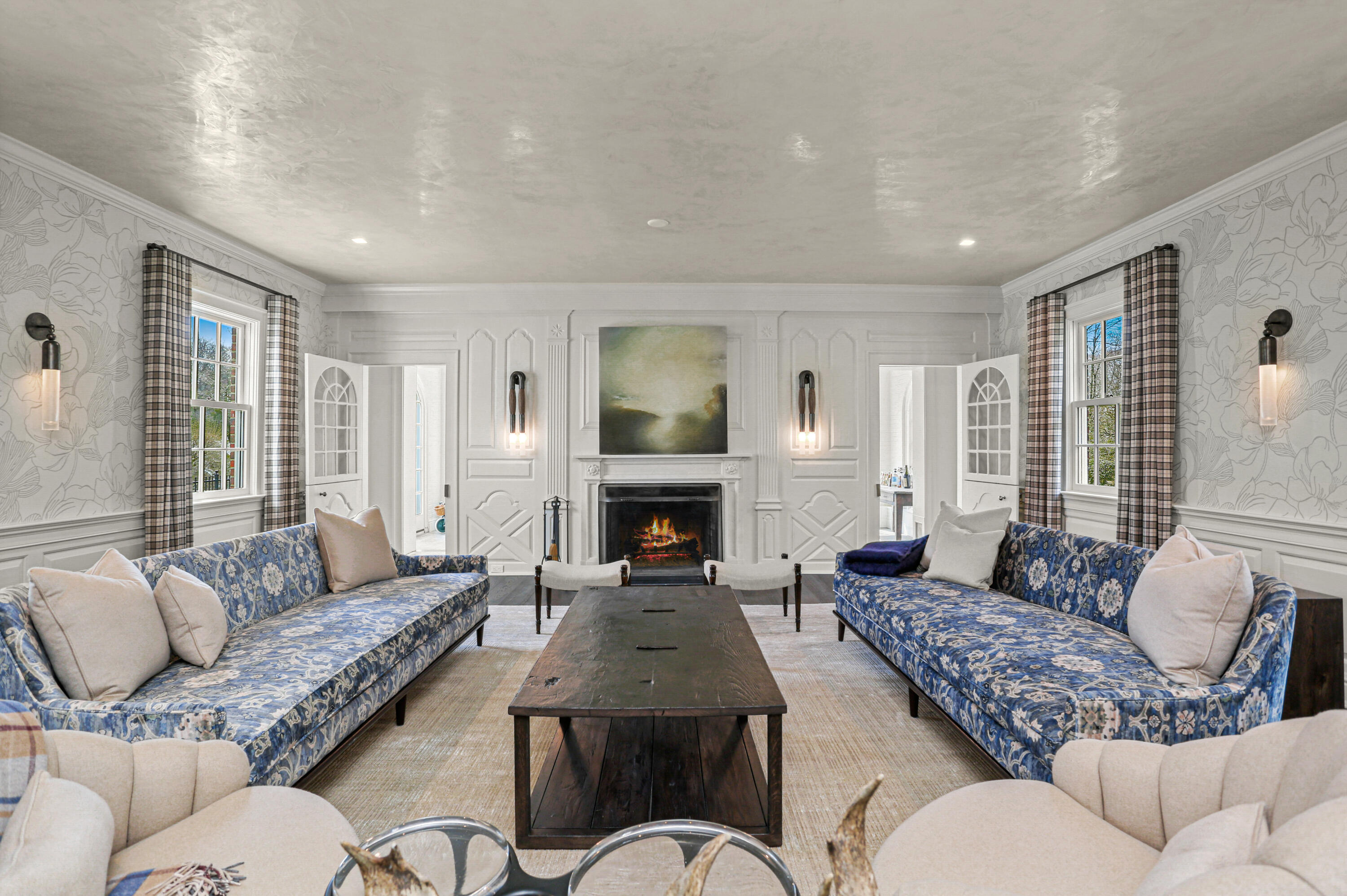 313 Stanwich Road Greenwich, CT 06830 - Photo 7 of 23 a living room with furniture and a fireplace
