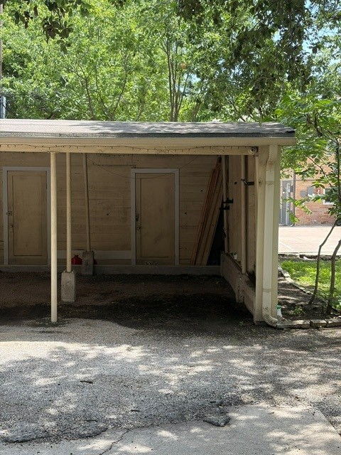 1703 Summit View Place, Unit A Austin, TX 78703 - Photo 12 of 13 A detached carport offers practical outdoor shelter and storage.