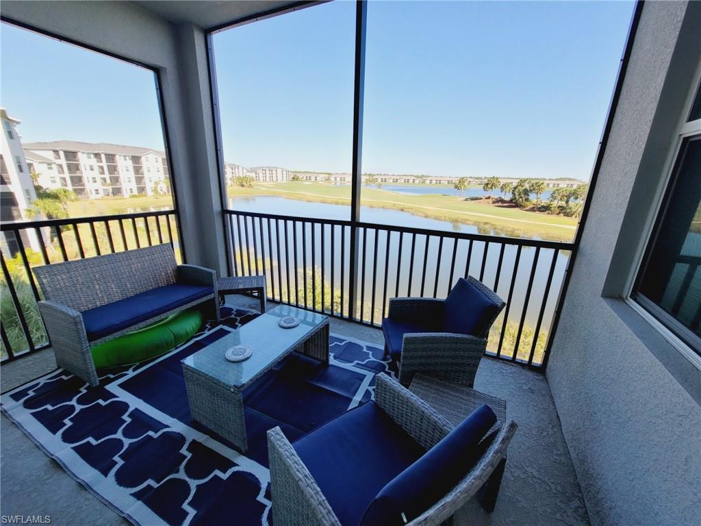 43997 Boardwalk Loop, Unit 1832 Babcock Ranch, FL 33982 - Photo 4 of 22 a view of a living room and wooden floor