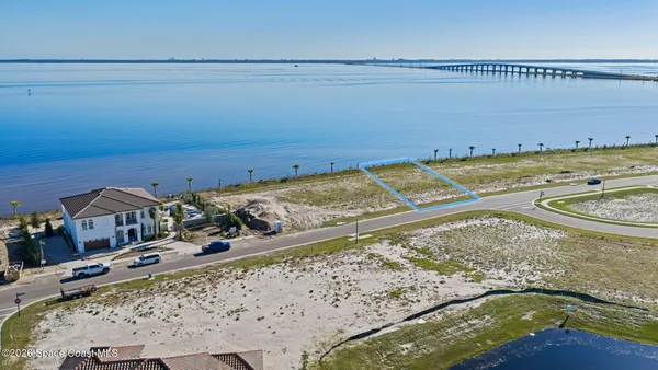 a view of a pool table and chairs