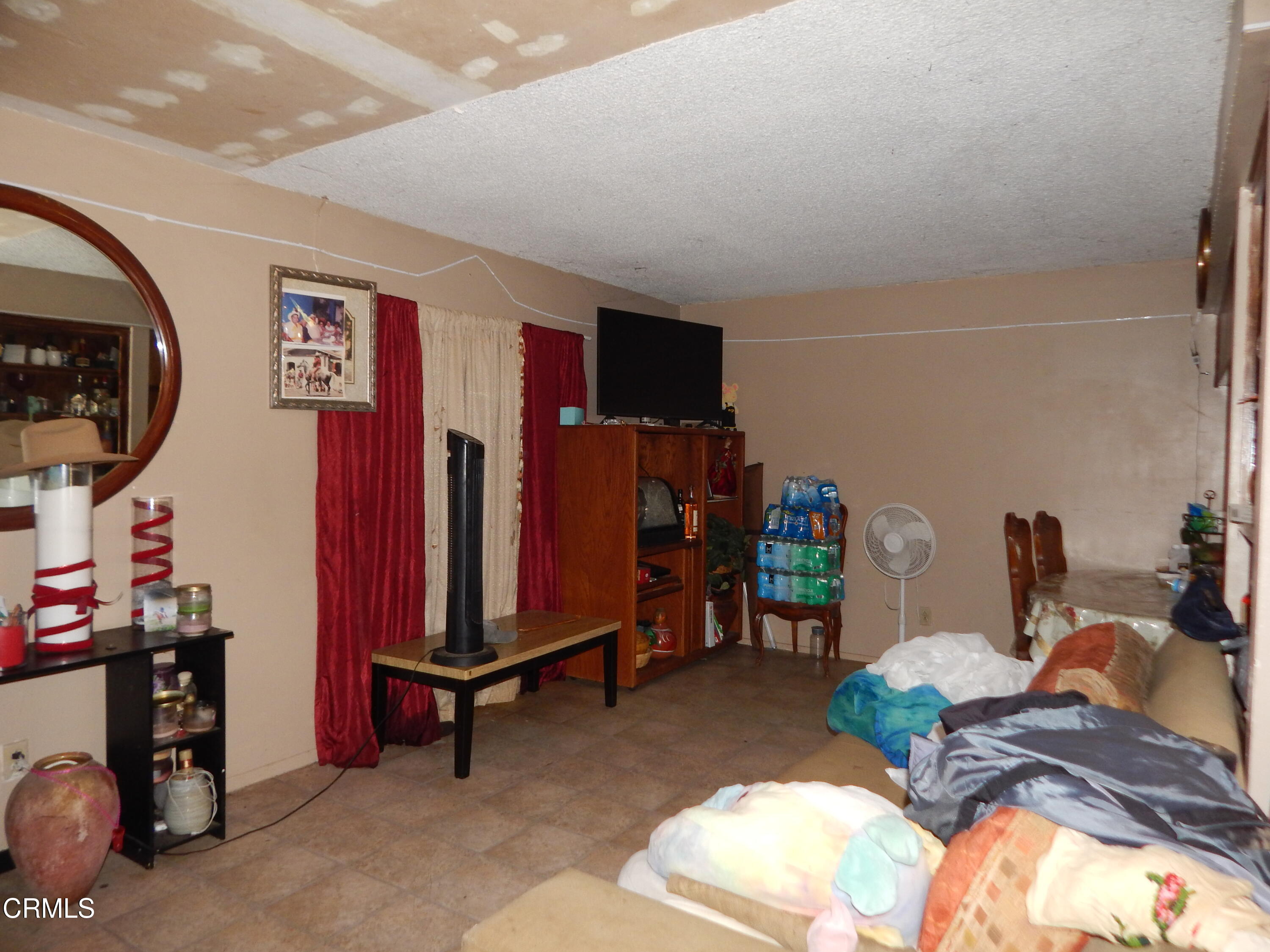2746 Friedrich Road Oxnard, CA 93036 - Photo 7 of 36 a bed room with a bed and a desk