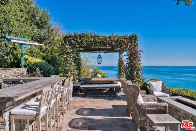 a view of a terrace with furniture
