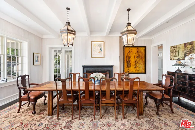 a large spacious bathroom with a double vanity sink a mirror and a bathtub