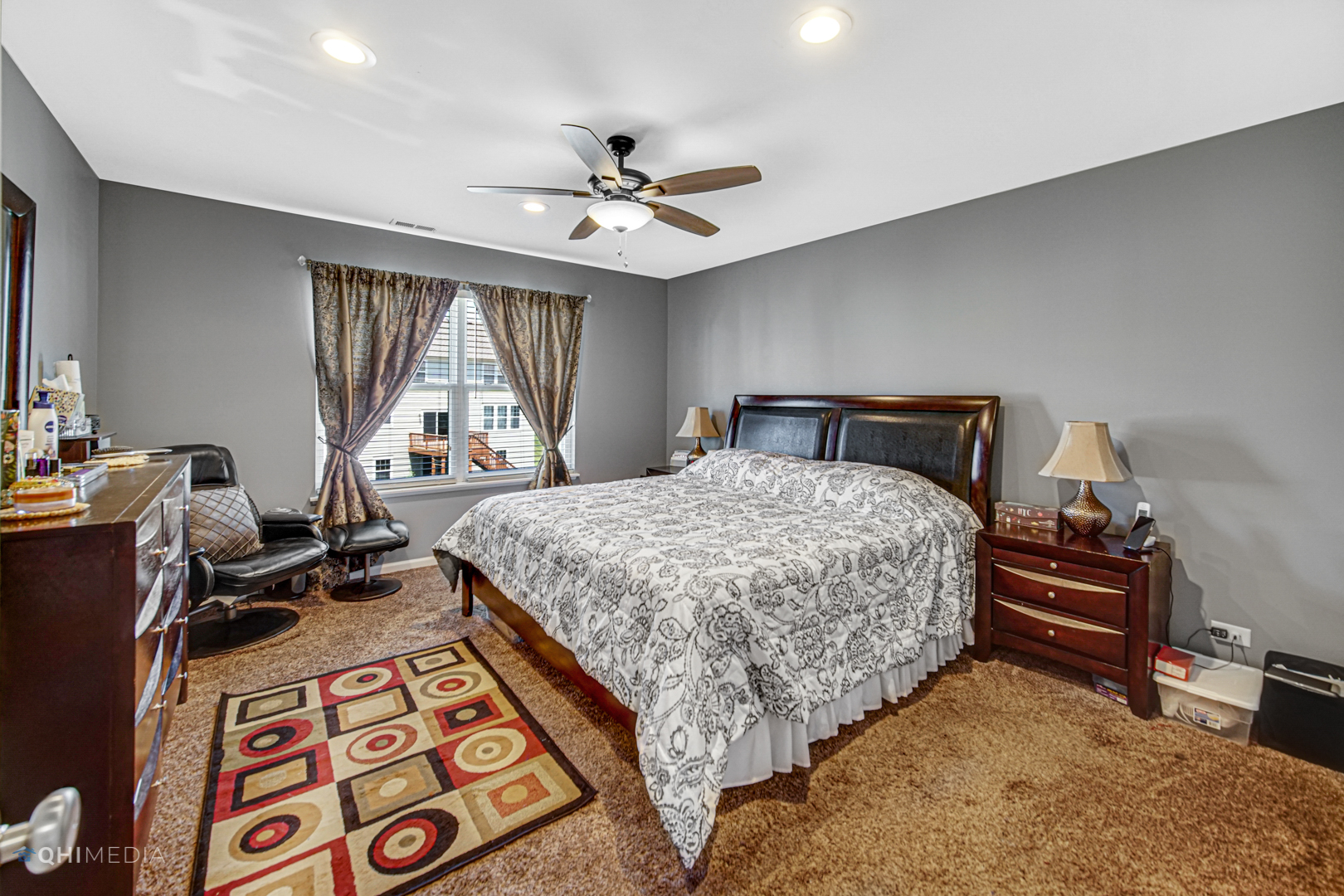 318 Monument Road Elgin, IL 60124 - Photo 20 of 31 a bedroom with a bed furniture and a window