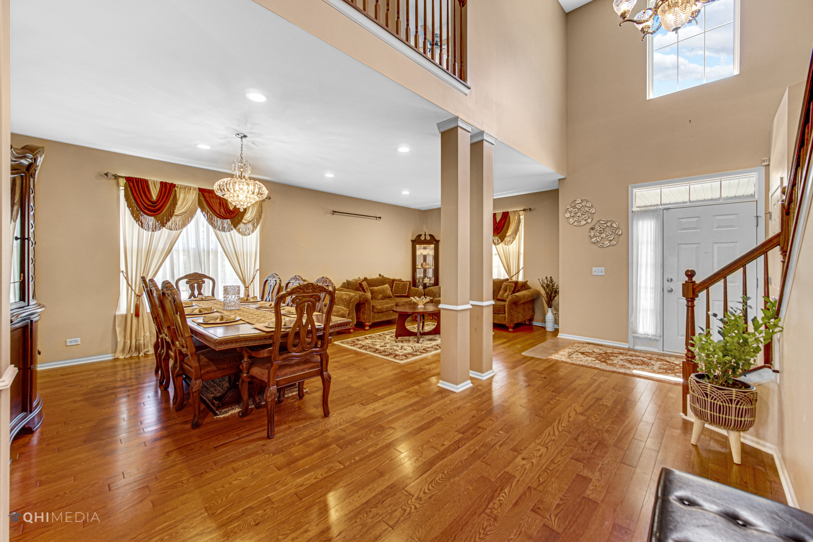 318 Monument Road Elgin, IL 60124 - Photo 7 of 31 a view of a dining room with furniture window and wooden floor