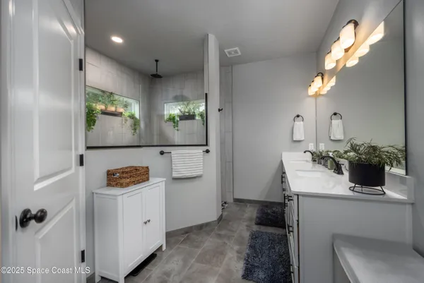 a view of a floor to ceiling window and an empty room