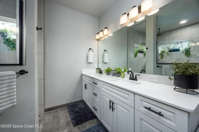 a bathroom with a sink and a shower