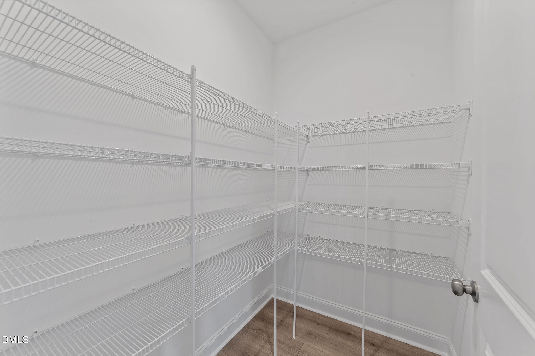 77 Watauga Way Clayton, NC 27520 - Photo 7 of 10 a view of a room with empty racks