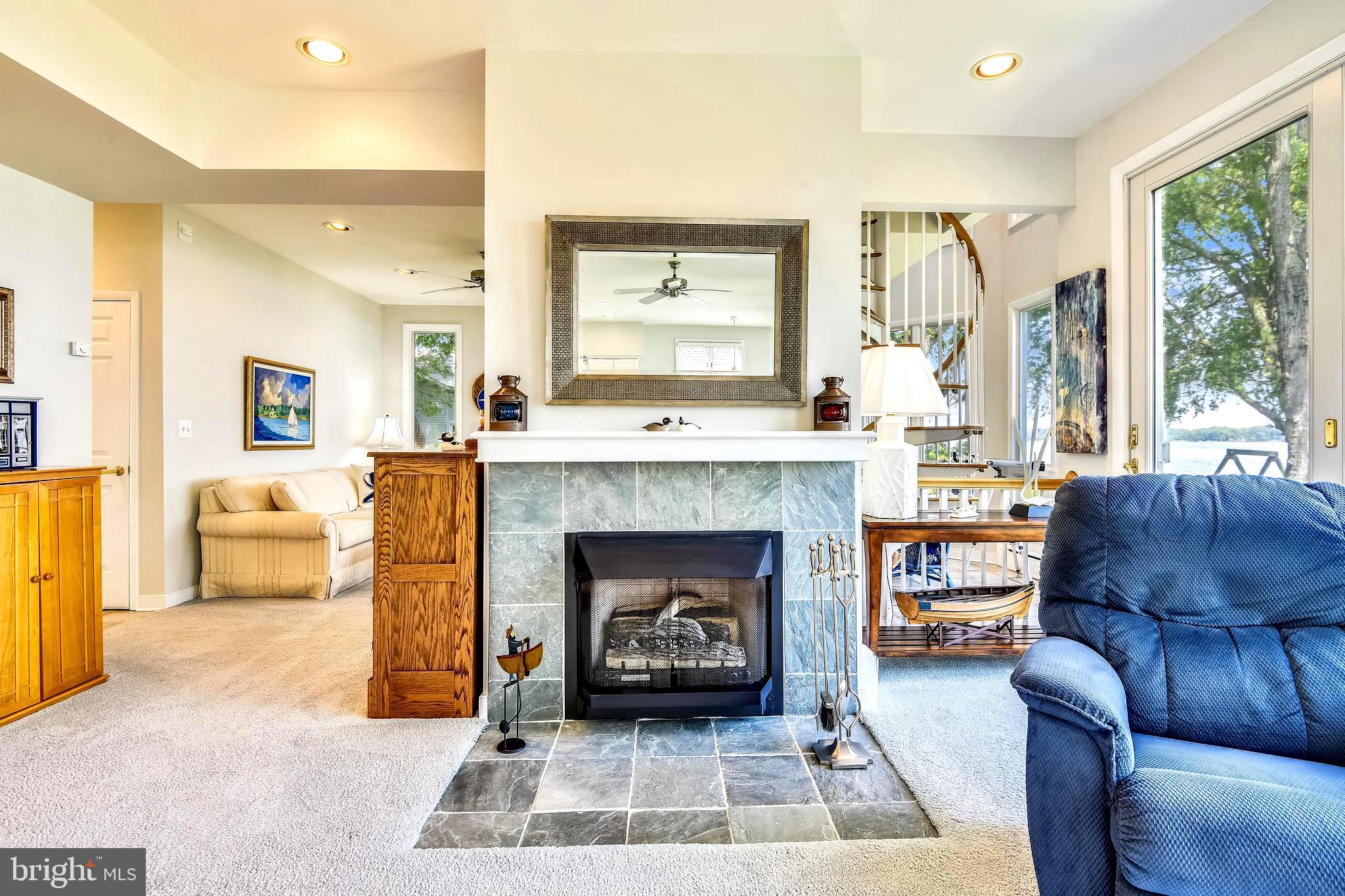 1356 McDonald Road Shady Side, MD 20764 - Photo 19 of 60 Slate Surround Fireplace for Cozy Gatherings