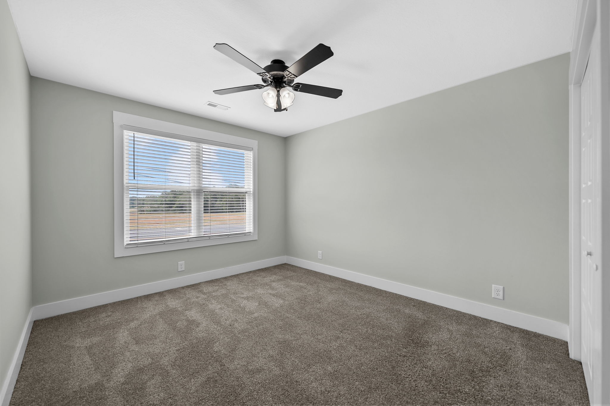 2509 Ashland City Road Clarksville, TN 37043 - Photo 28 of 32 a view of an empty room with a window