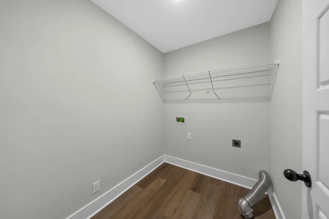 a view of a room with racks on the wall