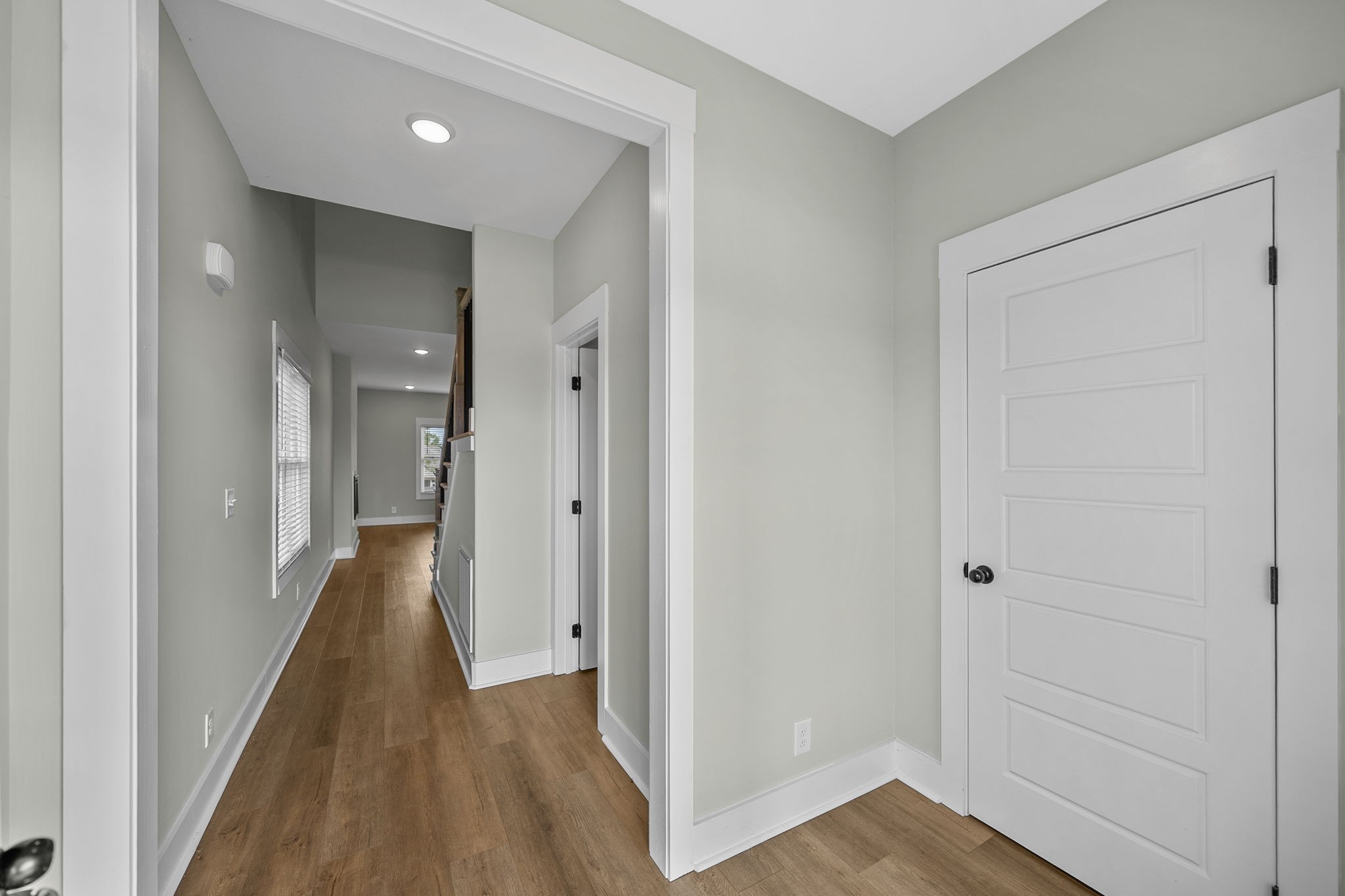 2509 Ashland City Road Clarksville, TN 37043 - Photo 3 of 32 a view of a hallway with wooden floor