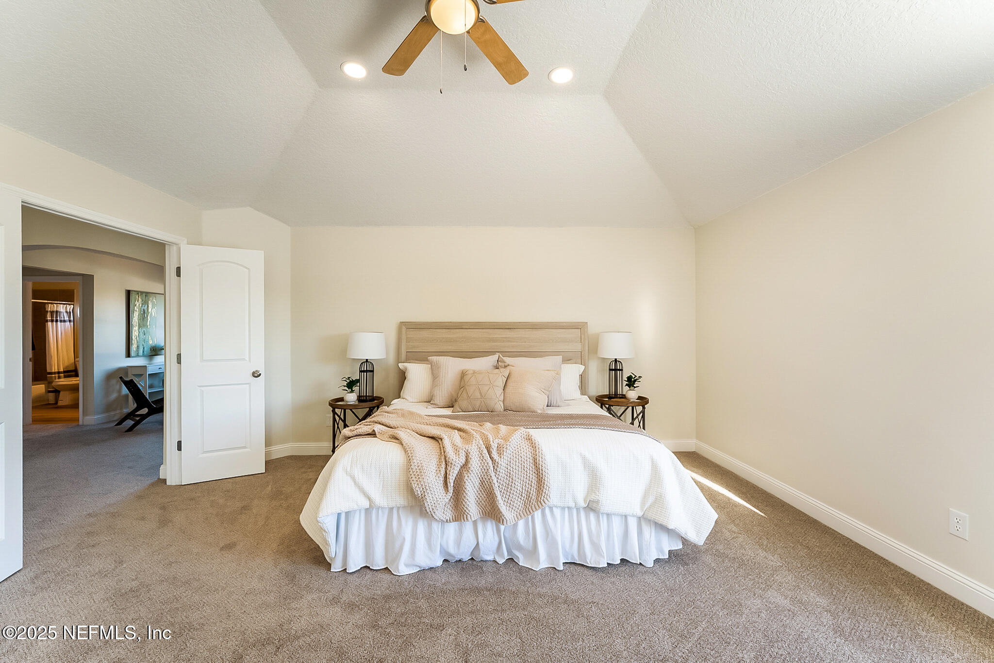 13962 Ibis Point Boulevard Jacksonville, FL 32224 - Photo 34 of 63 a bedroom with a bed and painting on the wall