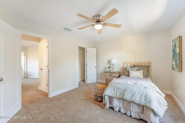 a kitchen with kitchen island granite countertop a sink and a counter top space