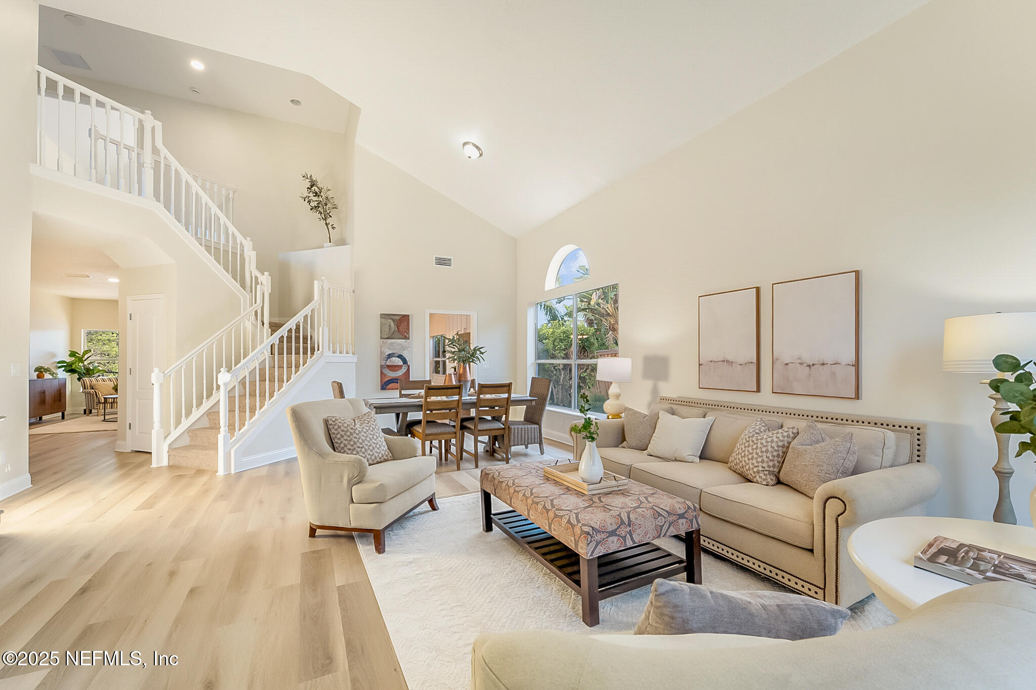 13962 Ibis Point Boulevard Jacksonville, FL 32224 - Photo 43 of 63 a living room with furniture and wooden floor