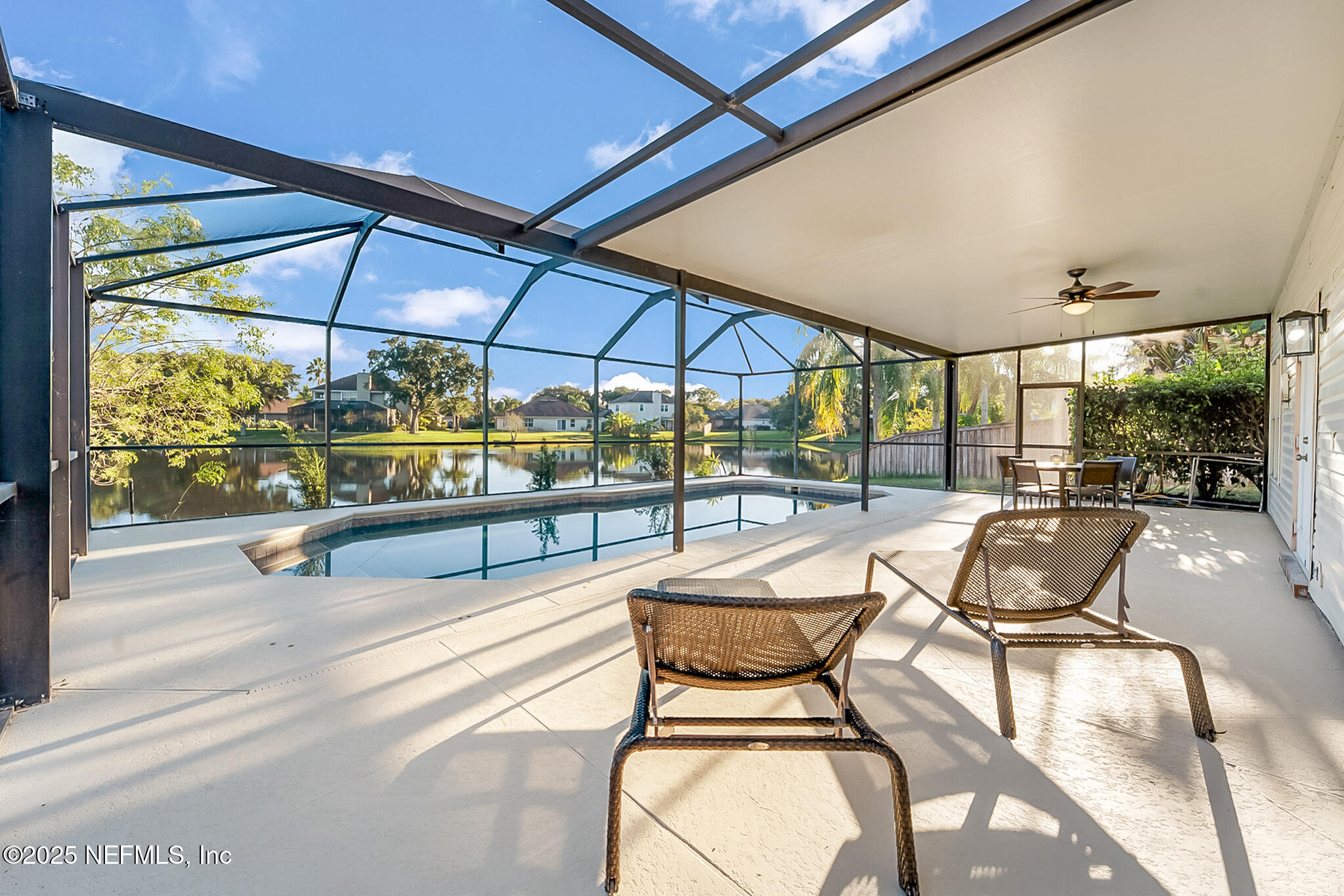 13962 Ibis Point Boulevard Jacksonville, FL 32224 - Photo 45 of 63 a view of swimming pool with outdoor seating