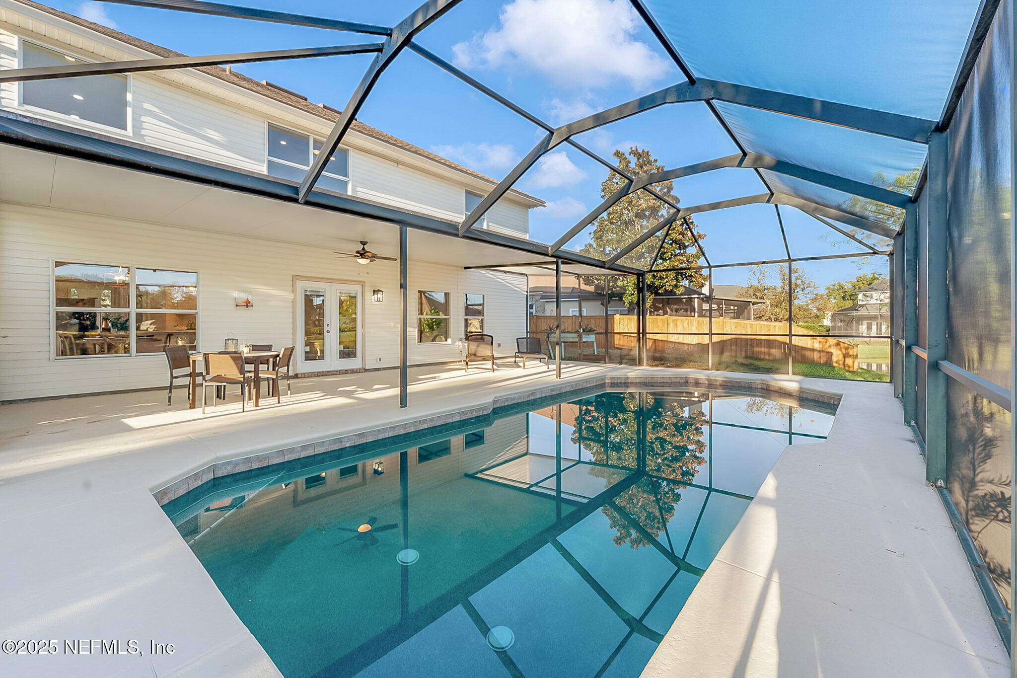 13962 Ibis Point Boulevard Jacksonville, FL 32224 - Photo 47 of 63 a view of a swimming pool with a patio