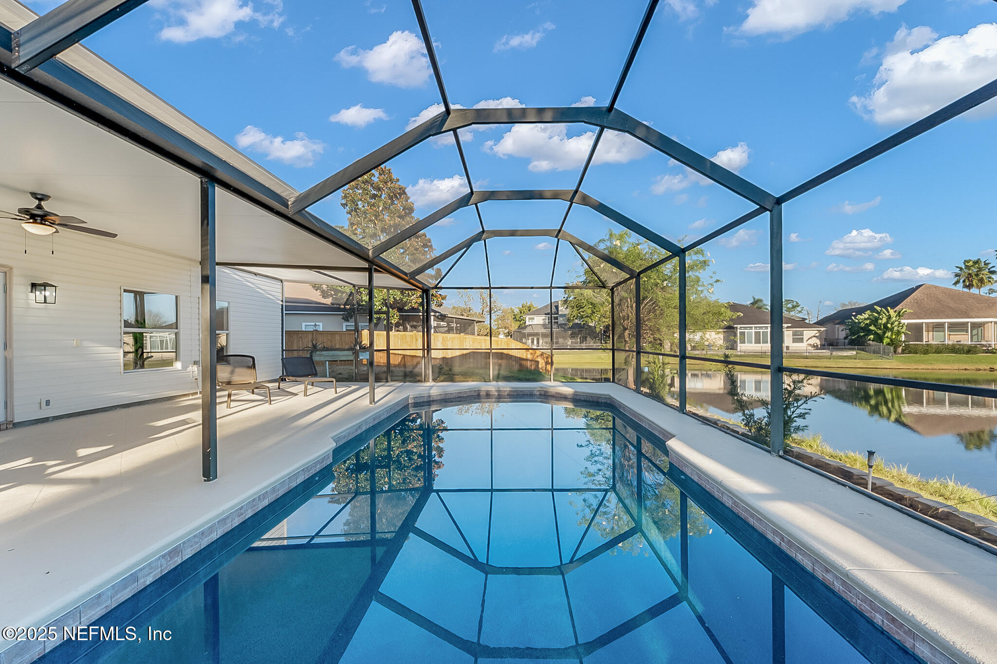 13962 Ibis Point Boulevard Jacksonville, FL 32224 - Photo 48 of 63 a view of a swimming pool with a balcony